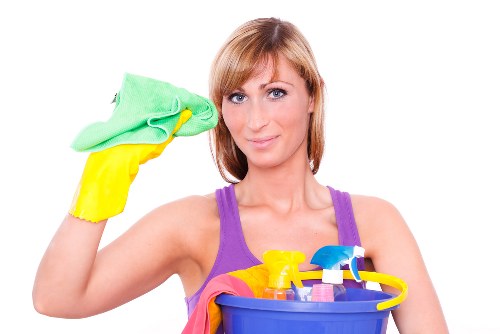 Professional cleaner maintaining a Dulwich family home interior